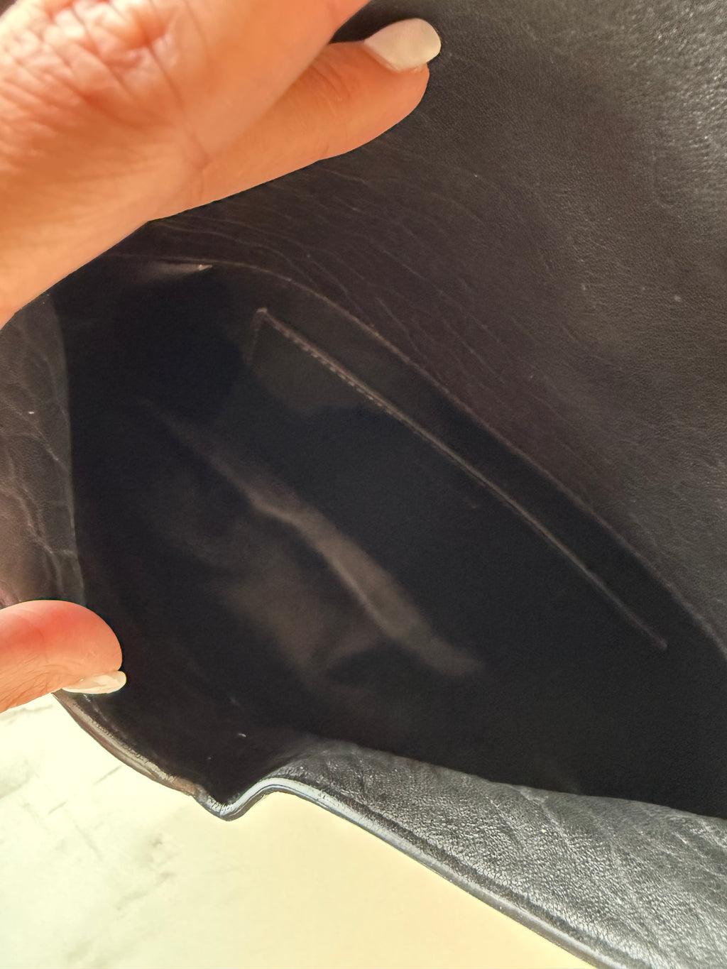 YSL Cassandre large textured-leather clutch