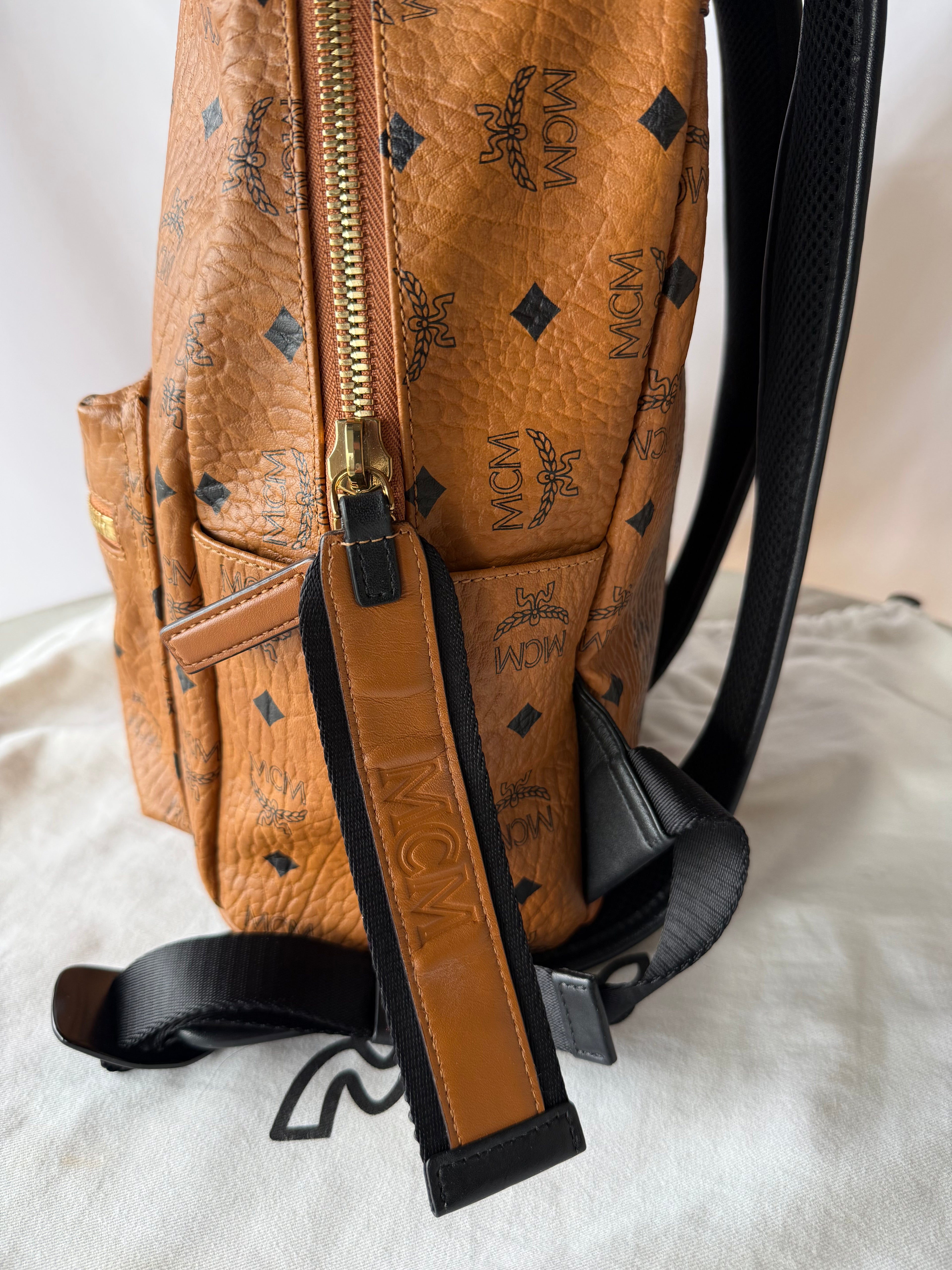 MCM Logogram Vicetos Backpack PVC Leather Brown / Gold