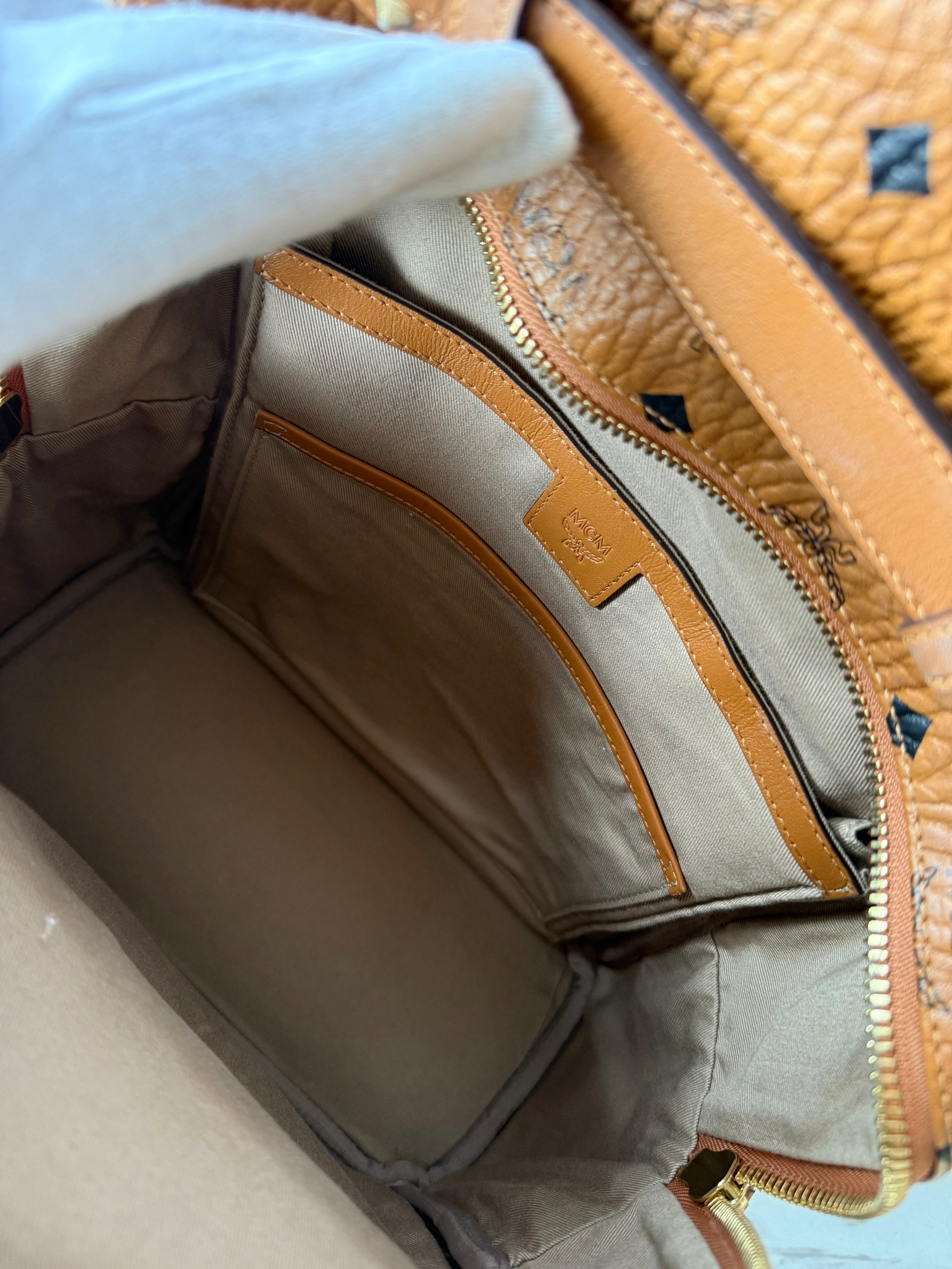MCM Logogram Vicetos Backpack PVC Leather Brown / Gold