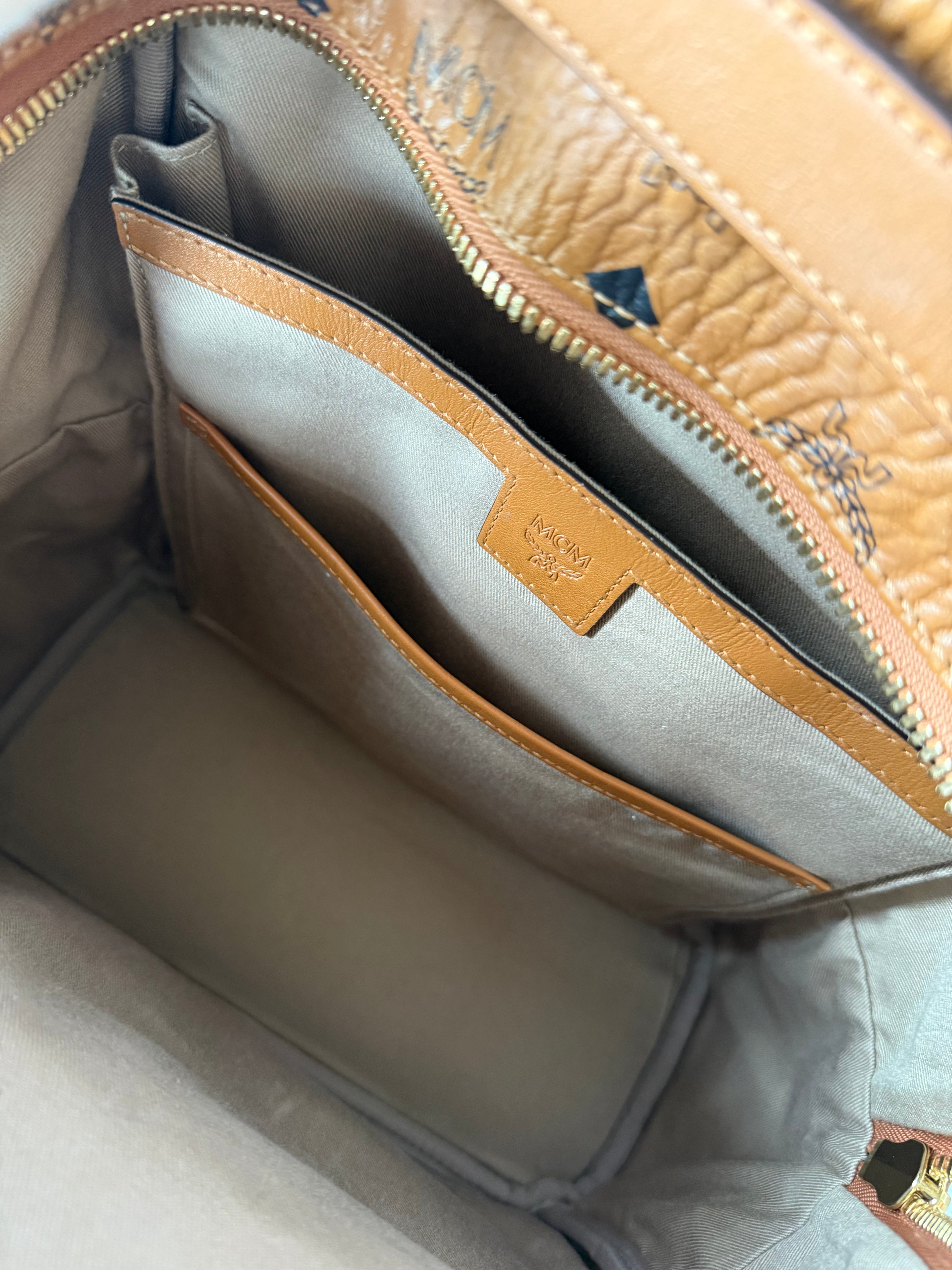 MCM Logogram Vicetos Backpack PVC Leather Brown / Gold