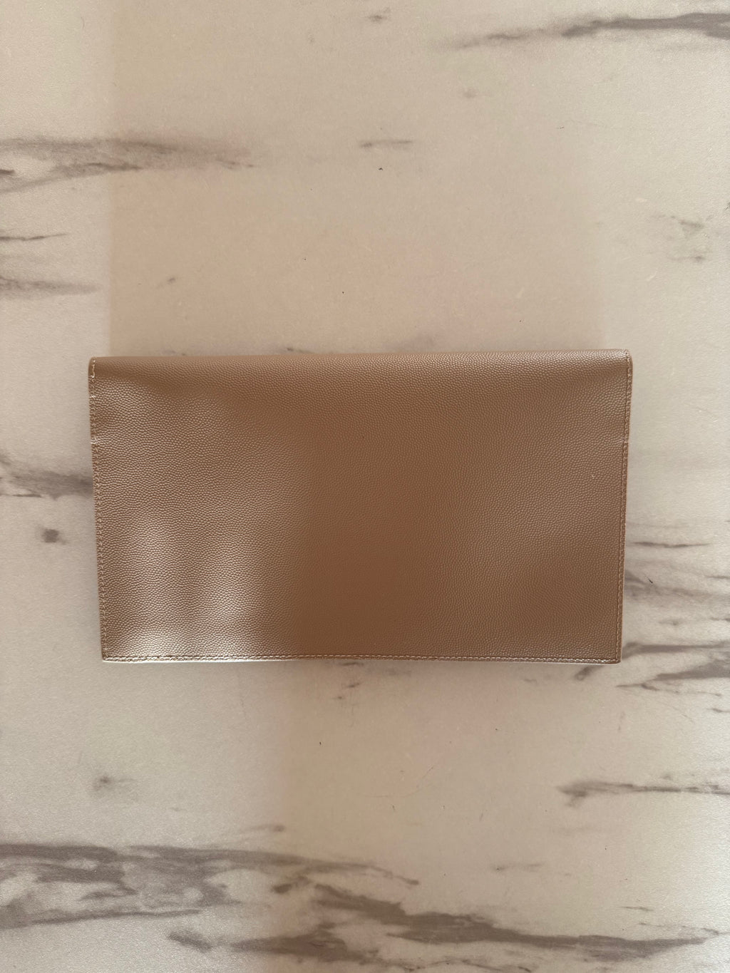 UPTOWN POUCH IN GRAIN DE POUDRE LEATHER BEIGE