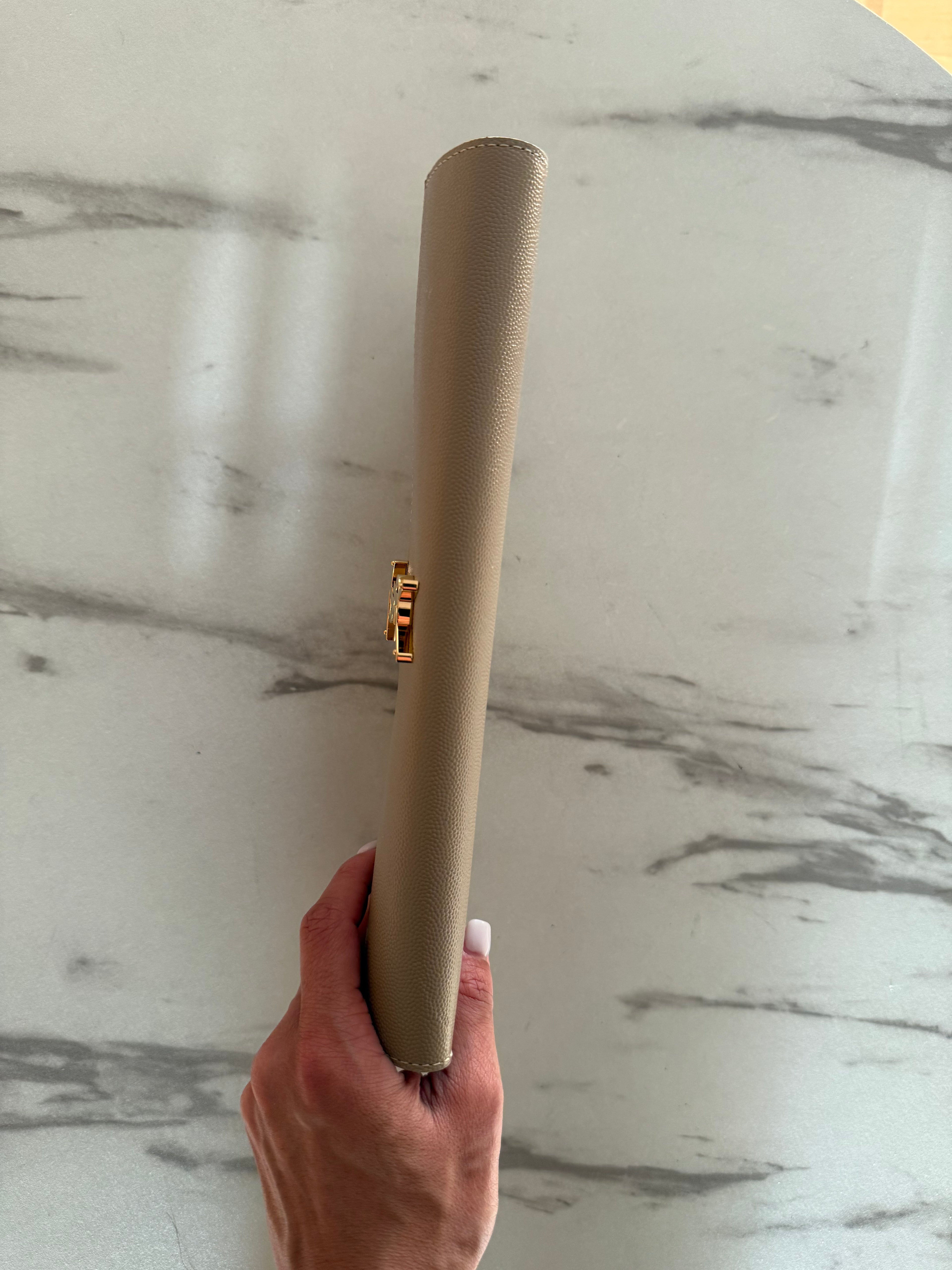 UPTOWN POUCH IN GRAIN DE POUDRE LEATHER BEIGE