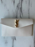 UPTOWN POUCH IN GRAIN DE POUDRE LEATHER
