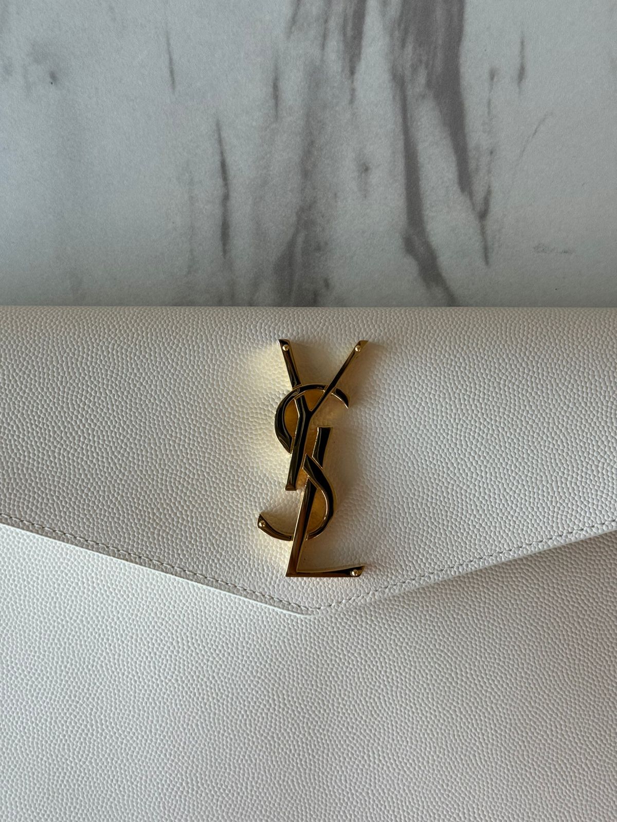 UPTOWN POUCH IN GRAIN DE POUDRE LEATHER