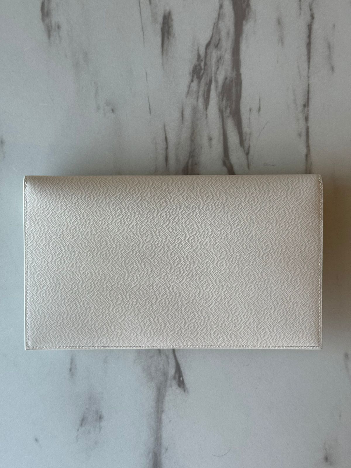 UPTOWN POUCH IN GRAIN DE POUDRE LEATHER